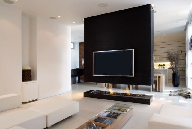 kaminofen glas trennwand tv wohnzimmer essbereich schwarz weiß