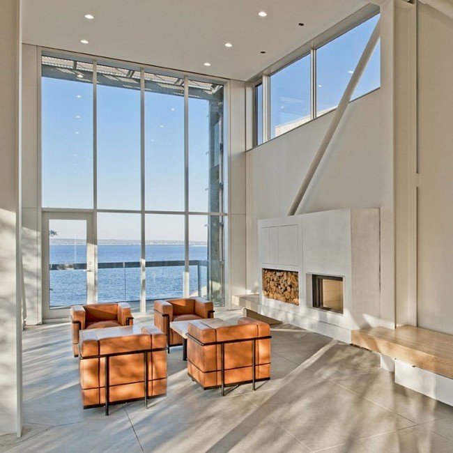 Familienhaus Design-raumhohe Glaswand-Indoor Kamin-Lederpolster sessel Sitzgruppe