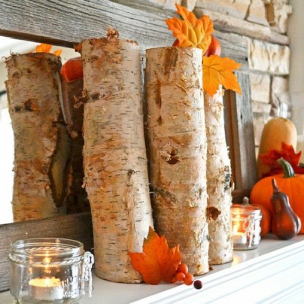 Baumstamm Vase Kaminsims herbstlich dekorieren Herbstblätter