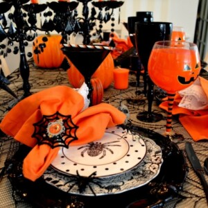 tischdeko halloween party elegant teller servietten orange raben spinnen