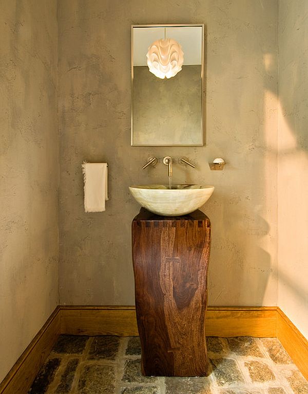 Badezimmer modern waschbecken freistehend holz dunkel natursteine wandverkleidung keramikfliesen dekoakzente