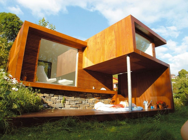 Holzfassade Verkleidung Stein Glasfassade Ferienhaus Wald