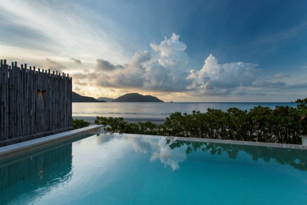 Sonnenuntergang Infinity Hotel Pools Design schön Vietnam Luxus Resort-Six Senses-Con Dao
