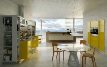 gelbe Küche planen gestalten kleine Kochinsel Bücherregal modern