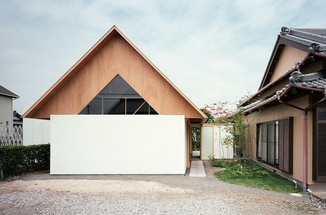 Architektur Haus Holzdach V-förmig