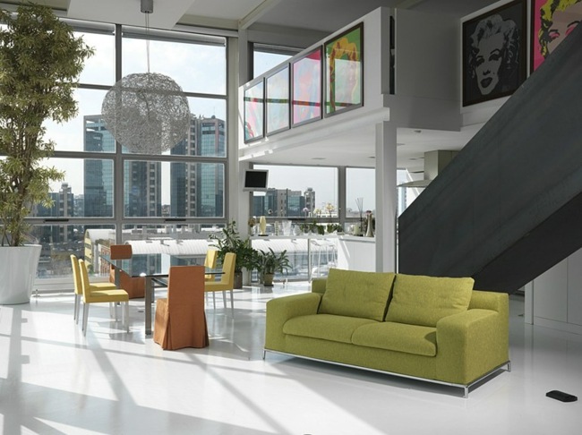 modernes Wohnzimmer einrichten grün Sofa Zweisitzer Stoff Polsterung