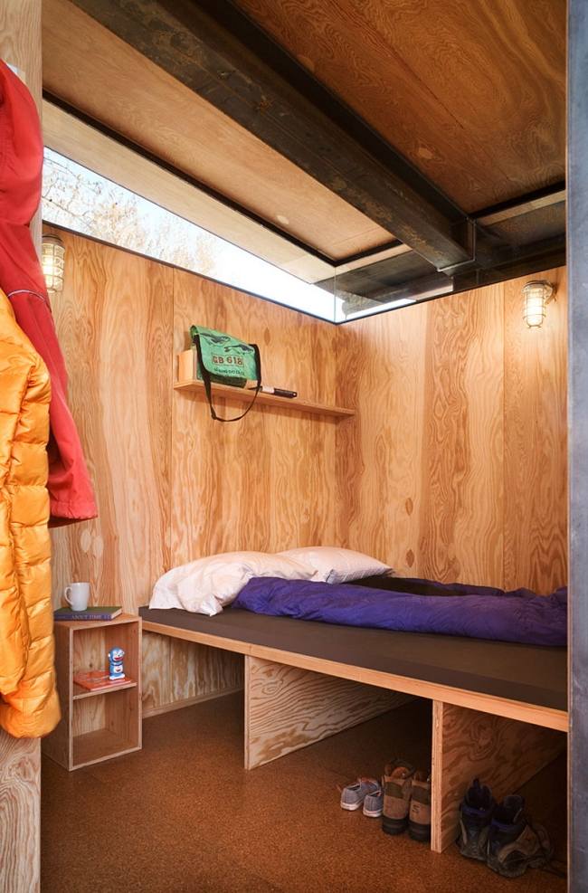 Hütte Einrichtung-gemütlich Bett-Dach-Öffnungen rolling-huts OSKA architects