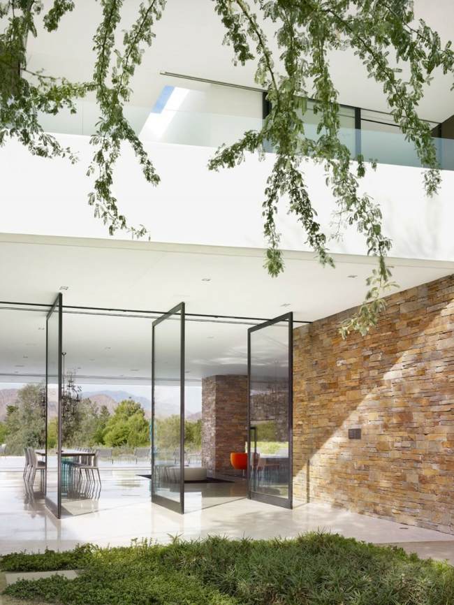  moderne Fassade Beton Glas Naturstein Garten