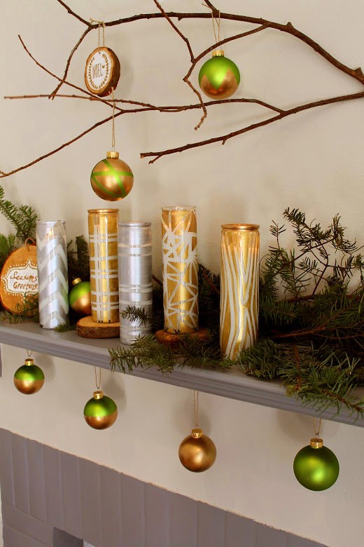 Weihnachtsdeko Selbermachen kaminsims gold grün kerzenhalter dekorieren-tannenzweige