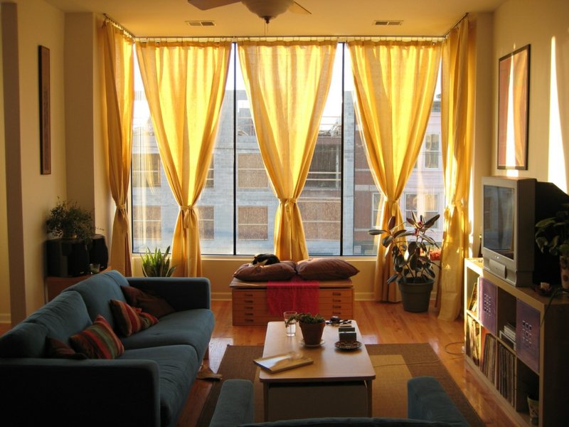 gardinen und vorhänge gelb design warme atmosphaere wohnzimmer