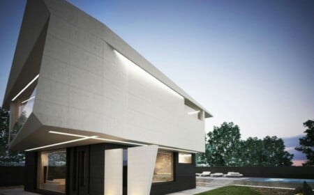 moderne minimalitische Architektur Beton Beleuchtung Fassade zwei Bauteile