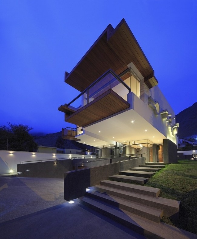 modernes einfamilienhaus lavastein holz einbauleuchten fassade