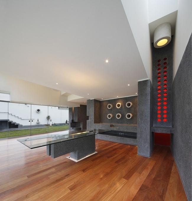 modernes wohnhaus peru innenarchitektur dielenboden schwarzer stein