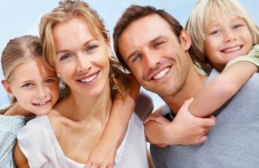 schönes Lächeln Familie gesunde Zähne Kinder Eltern