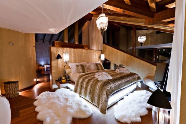 Design Ski Chalet-Zermatt Schlafzimmer-Tierfelle weiß Rustikale Details