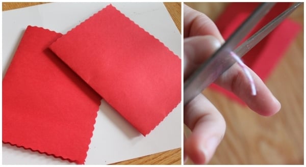 rotes papier gefalten feiern figuren mit schere schneiden gestalten