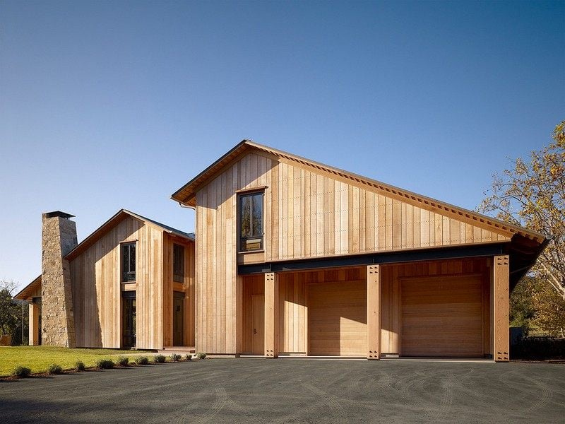 Haus-Pultdach-Holz-Fassade-Naturstein-modern