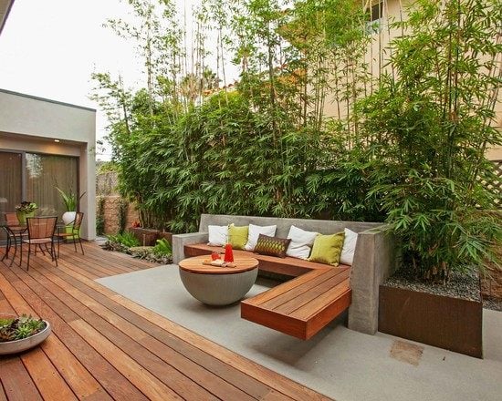 terrassen ideen garten bambuspflanzen sichtschutz beton holz sitzbank tisch