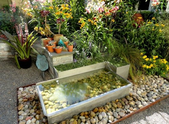 Garten-Gestaltung klein Gartenteich Flusssteine Dekoration Ideen