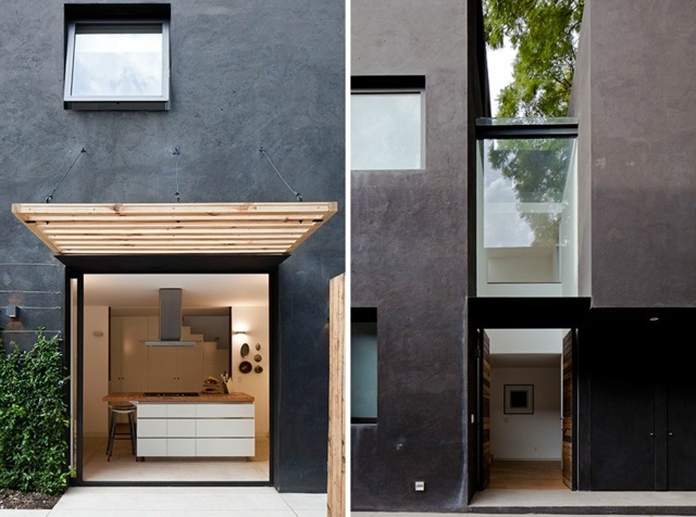 Flur Glaswand minimalistische moderne Kochinsel schwarze Fassade