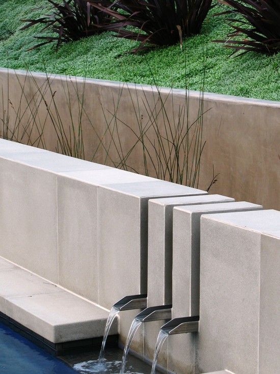 Wasserspiele-Garten Schwimmteich Wasserfall moderne minimalistische Architektur Beton Becken
