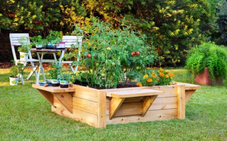 hochbeete im garten sitzbank idee beistelltisch tomaten blumen sitzbereich