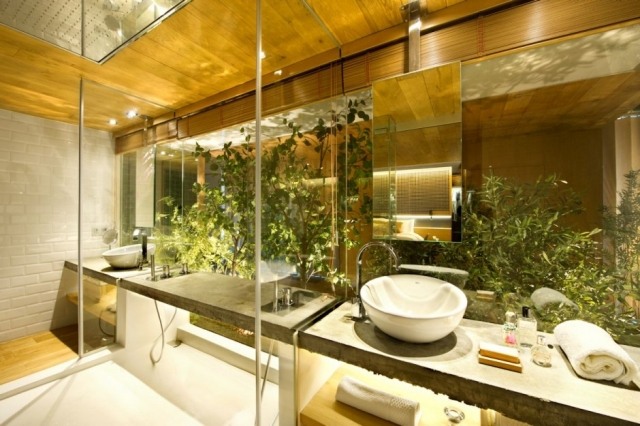  loftwohnung badezimmer beton waschtisch glaswand