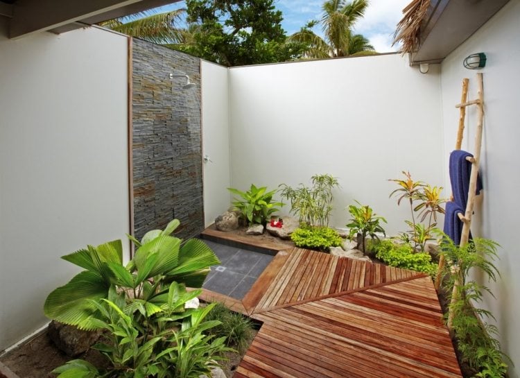 outdoor-bathroom-with-stand-shower-and-wooden-deck-for-tropical-house-design