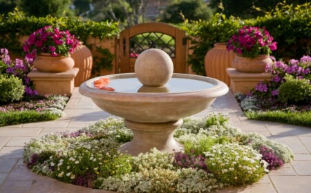 garten brunnen aus stein klassisch stil blumenbeet bodendecker kugel