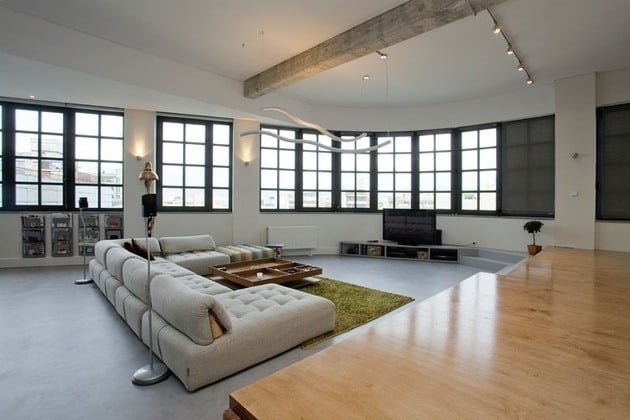 Wohnung einrichten renovieren Ideen Sofa grün Teppich