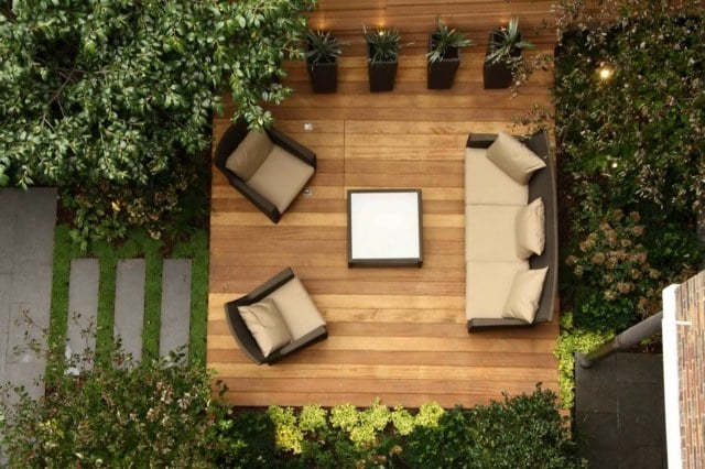 Rattan Möbel Holz Bodenbelag Terrasse Pflanzen Beleuchtung