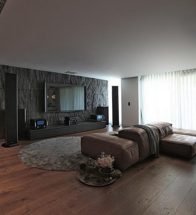 lounge wohnzimmer dielenboden ledersofa grau braun