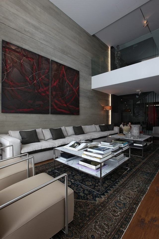 moderne einrichtung wohnzimmer grau wand kunst Tanju Oezelgin