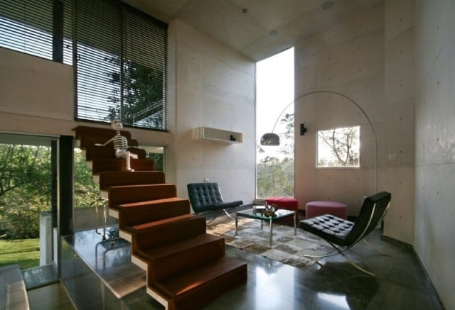 modernes beton wohnhaus innenraum treppen lounge bereich