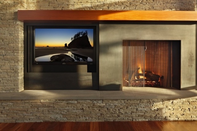modernes wohnzimmer holzkamin steinverkleidung tv wand paneele