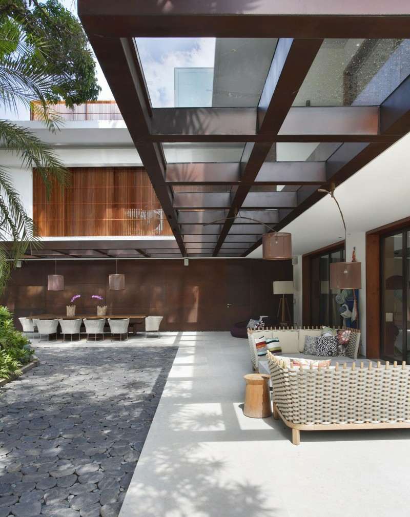terrassenüberdachung bauen holz geruest glas idee korb moebel palmen