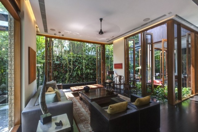tropisch inspiriert Wohnzimmer-ledersessel schwarz teppich vintage look