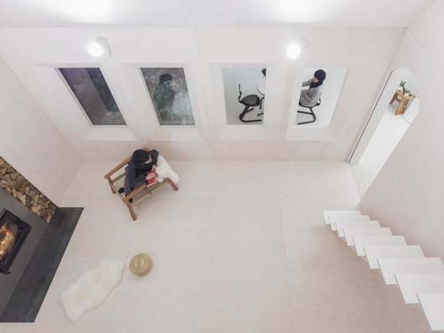 Kamin Wohnbereich puristisch eingerichtet moderne Kunst Wandgestaltung-moderne-Architektur Aussicht oben
