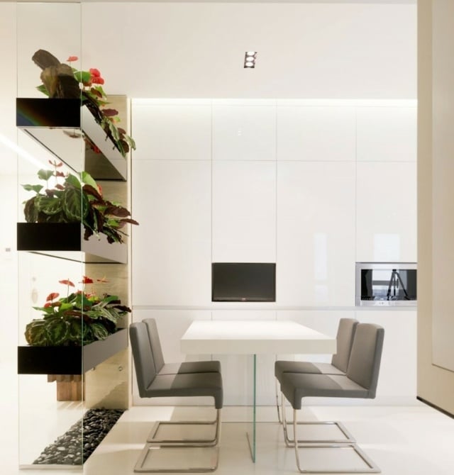 Wohnung kreativ gestalten Wand Pflanzkisten Tisch Stühle