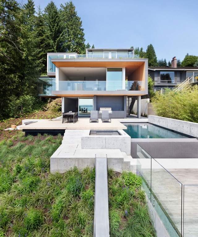 kanada Haus am Steilhang pool beton terrasse glas geländer