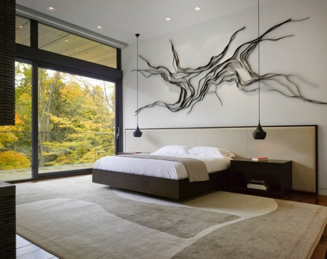 modernes schlafzimmer beige braun schiebetüren balkon wanddeko