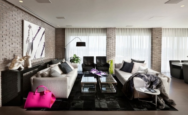 städtische wohnung-wohnzimmer sofa set mit kissen ziegelmauer wanddesign hochfloriger-teppich