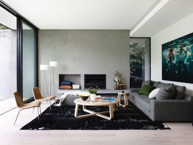 tendenzen wohnzimmer gestaltung mit farbe-schwarzer teppich hochflor holz tische