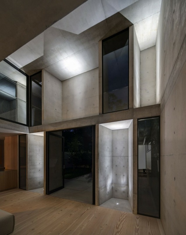 Beton Massivbau ein Volumen kompakt Fassaden Gestaltung