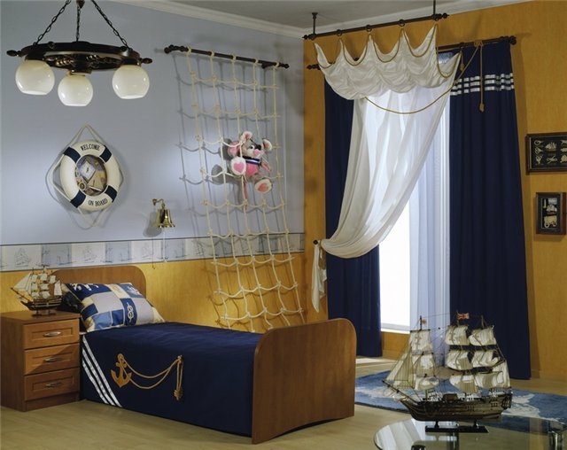 Kinderzimmer einrichten Schiffe Bett gold blau weiß