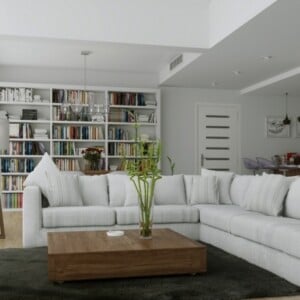Wohnzimmer mit Küche einrichten einheitlich wirken Regalsystem Bücher Wand