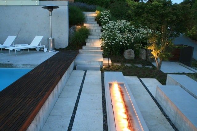 Moderne Gartengestaltungsideen pool offene feuerstelle  beton Ambleside