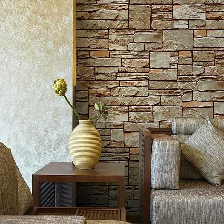 ideen zur wandgestaltung stein putz beistelltisch vase sofa grau textil