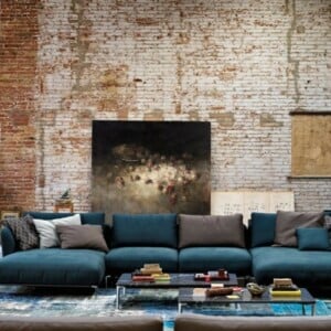 ideen zur wandgestaltung ziegelstein modern putz sofa blau