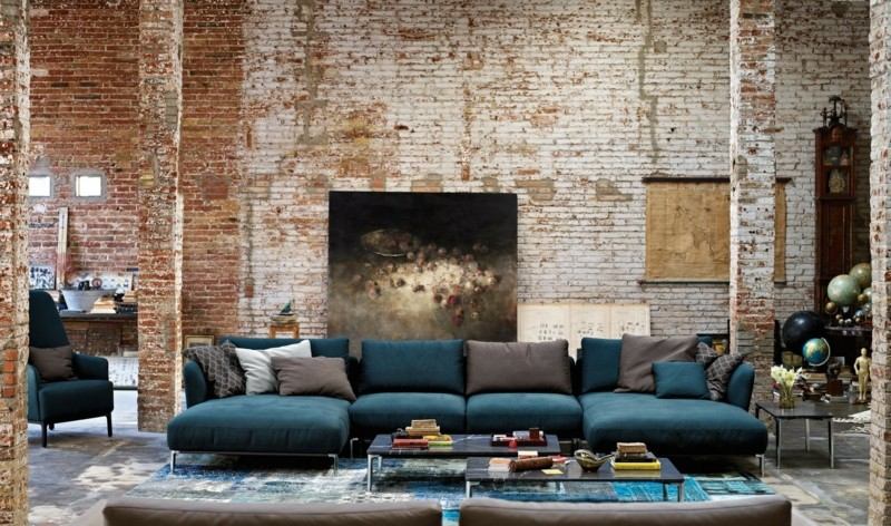 ideen zur wandgestaltung ziegelstein modern putz sofa blau
